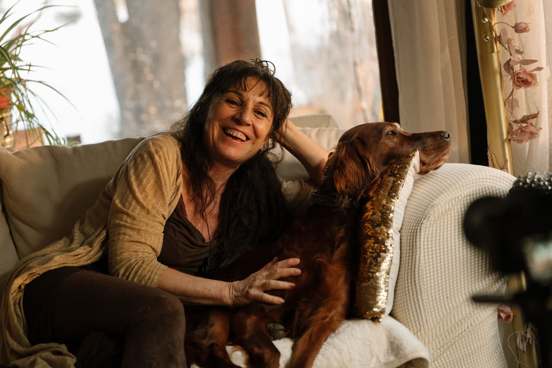 Elisabeth Serra at home with her dog